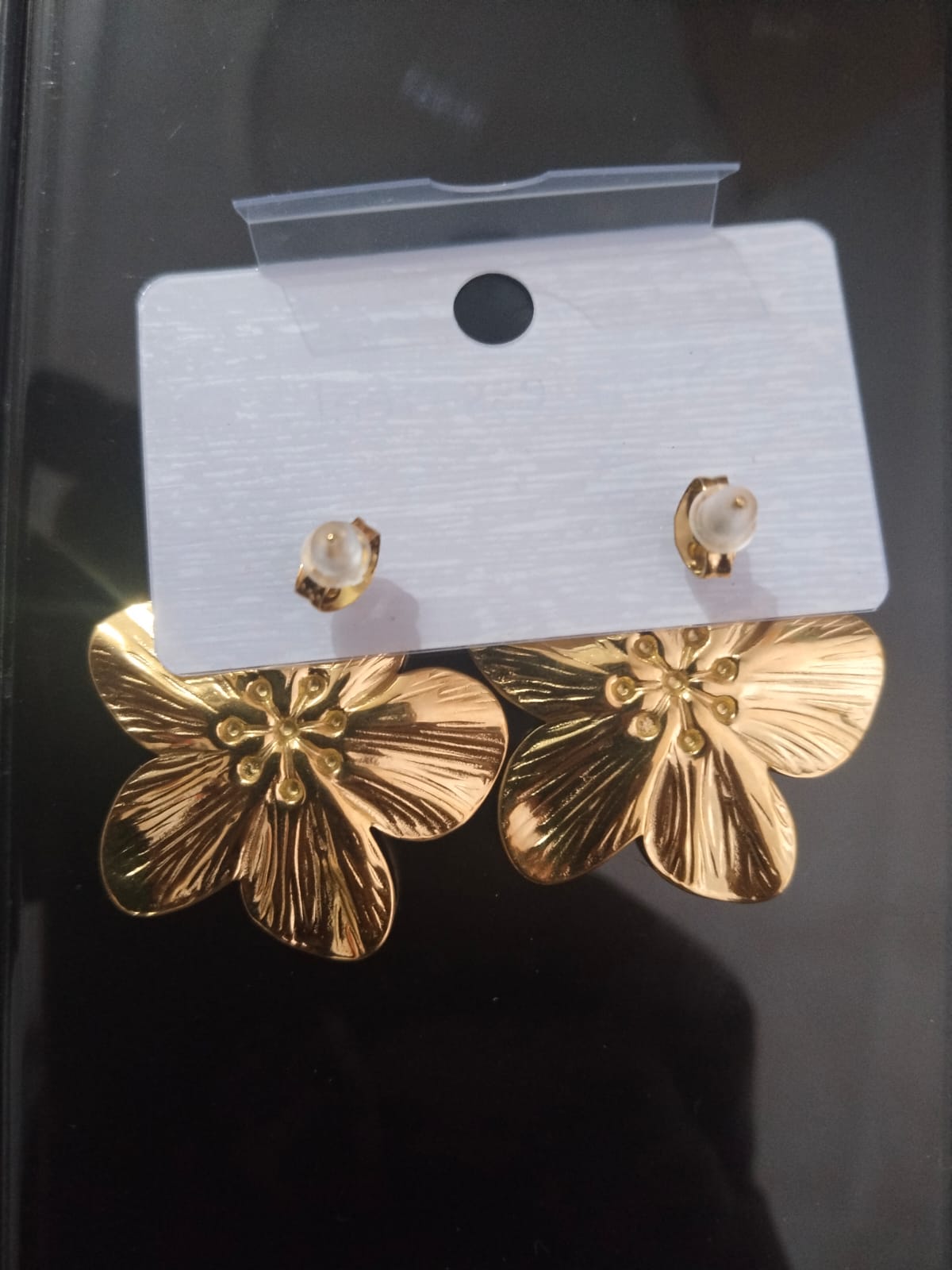 Gold floral stud earrings
